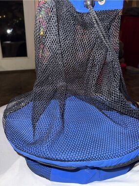 Blue and Black cooler with fishnet storage on top- the original Koozie Brand